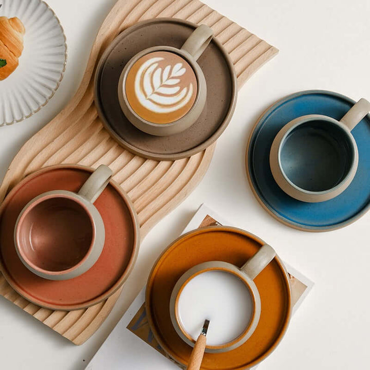 ZenCrafter Coffee Mug Set featuring colorful ceramic mugs and saucers on a wooden tray, inspired by traditional Japanese stoneware